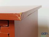 a close up of a wooden table with a drawer on it