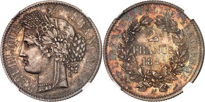 a close up of a coin with an image of a woman on it