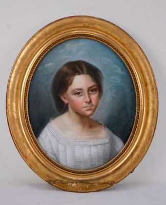 portrait of a young girl in a white dress in a gold frame