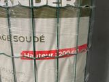 a picture of a roll of gabio paper wrapped in a wire fence
