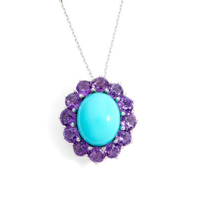 PENDENTIF présentant un dessin végétal avec en son centre un…