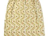 a white skirt with a floral pattern on it