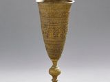 gold goblet in the shape of a cup