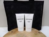 two tubes of lotion sitting on a wooden tray