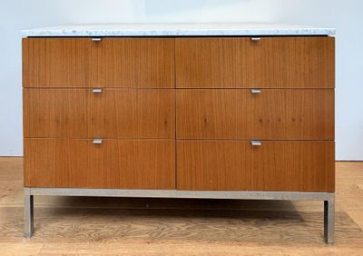 an image of a wooden dresser with a marble top