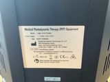 the back of a machine that is sitting on top of a table