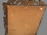 a picture of a wooden frame with a picture on it
