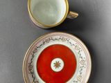an overhead view of a cup and saucer sitting on a table