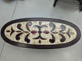 a picture of a table with a tile design on it