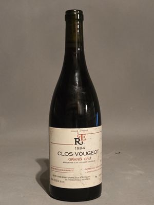 a bottle of wine that is sitting on a table