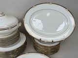 several plates and bowls are stacked on top of each other