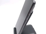 a cell phone that is sitting on a stand