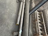 a bunch of metal pipes that are on the ground