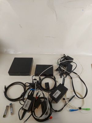 a lot of wires and cords on the table
