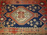an image of a rug with a cross on it