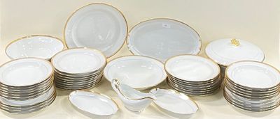 a lot of plates that are sitting on a table