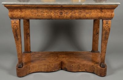 an old wooden table with a marble top on a gray background