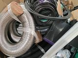 a cardboard box full of assorted electrical equipment