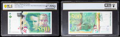 three different types of currency are displayed in a display case