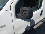 an image of a white truck with a side view mirror