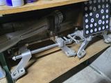 a shelf that has a bunch of tools on it