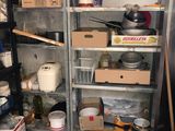 many boxes and containers on the shelves in the kitchen