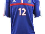 a close up of a soccer jersey with the number 12 on it