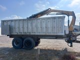 a dump truck with a crane on the back of it