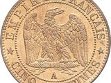 a close up of a coin with an eagle on it