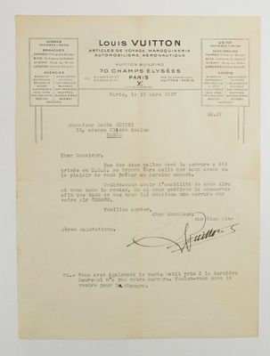 a close up of a document with a handwritten letter on it