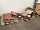 a pile of cardboard sitting on a pallet in a warehouse