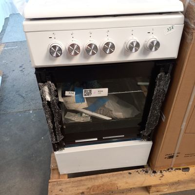 a white stove that is sitting on a pallet