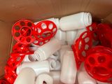 a box full of plastic bottles and other items in it