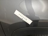 a close up of a sticker on the side of a car