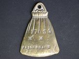 a small metal object that is on a black surface