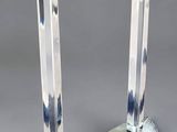 two candles that are sitting on top of each other