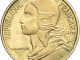 une image montrant un gros plan d'une pièce de monnaie sur laquelle figure le visage d'une femme