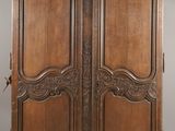 une paire de portes anciennes françaises en bois sculpté