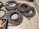 a lot of hoses that are laying on the floor
