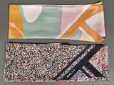 two different types of ties laying on top of each other on a table