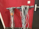 two hoses that are connected to the wall