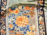 a table runner with a floral design on it
