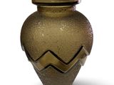 a vase that is sitting on a white surface