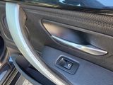 a close up of a car door handle with the door handle open