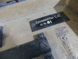 a close up of a piece of wood with a sign on it