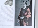 a book with a picture of a man smoking a cigarette