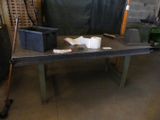 a table with a roll of toilet paper on it