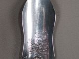 a spoon that is sitting on a table