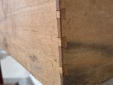 a piece of wood sitting on top of a table