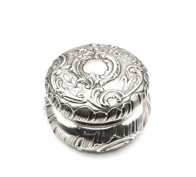 a silver box that has a design on it